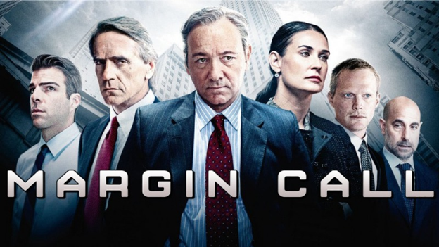 Promotional artwork for the film Margin Call showing the ensemble cast of investment bank executives in front of a city skyline.